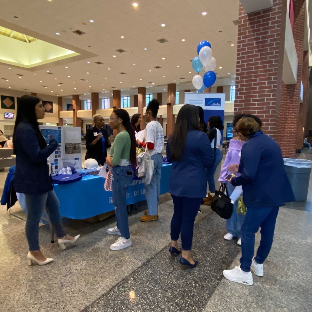 Linde volunteers talking with students at a Nerdy Girl Success career event